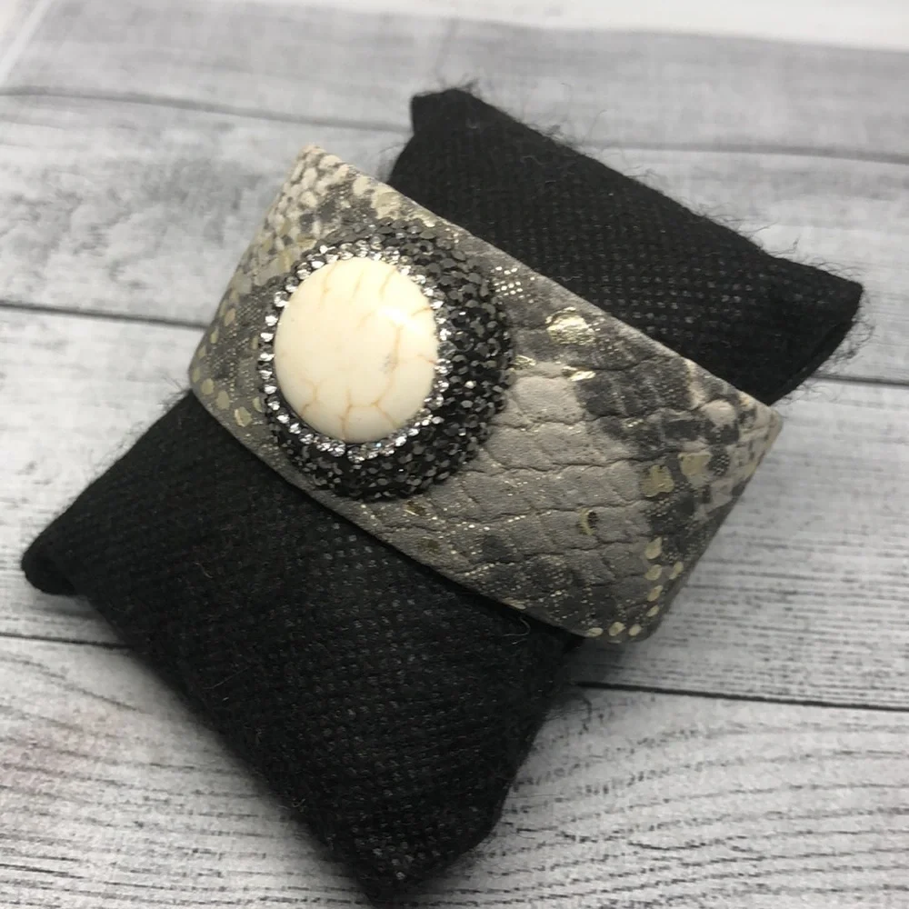 Snakeskin textured faux leather dressy statement cuff bracelet with stone